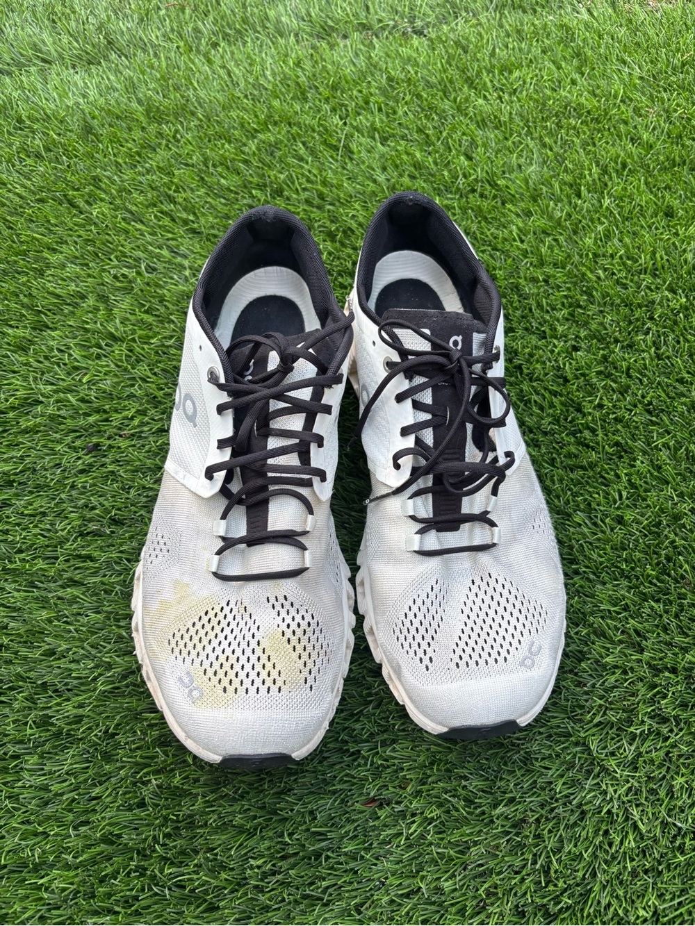 On Running Men’s White and Black Athletic Running Shoes